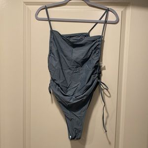 Adjustable high hip one piece